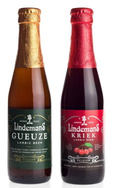 Bottles of Belgian Lindemans Lambic fruit beer isolated on a white background clipart