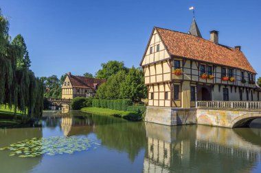 Entrance house of the Steinfurt castle with reflection in the water clipart