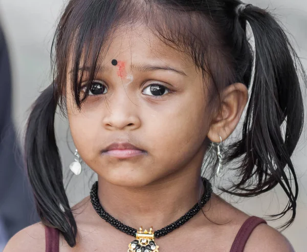 Closeup portrait mowgli indian little girl in a loincloth hides hiding in  tropics green forest background. High quality photo Stock Photo | Adobe  Stock