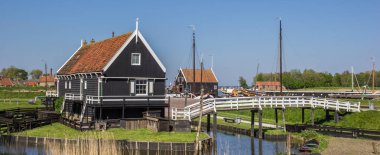 Panorama of wooden house at the lake in Enkhuizen, Holland clipart