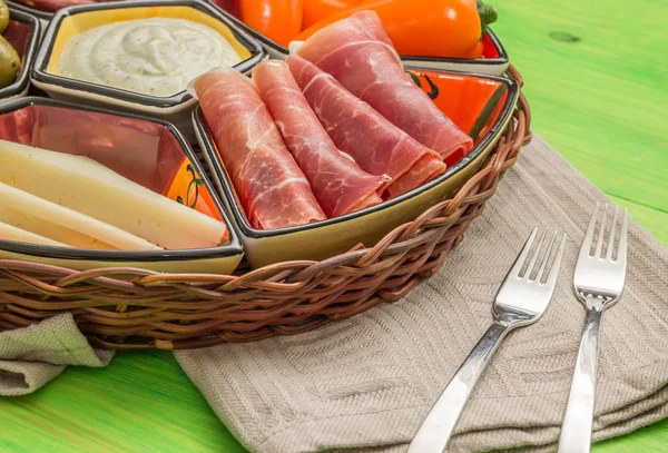 Basket Spanish Tapas Rustic Green Wooden Table — Stock Photo, Image