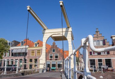 Historical bridge and houses in the center of Alkmaar, Netherlands clipart