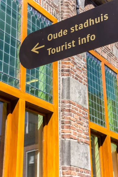 Tourist info sign in front of the town hall of Hasselt, Netherlands