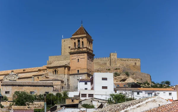 Church tower and castle on the hilltop of Alcaudete — Stock Photo, Image