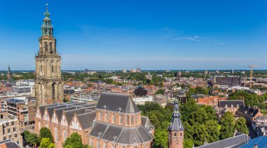 Historic Martini church tower dominating the skyline of Groningen, Netherlands clipart