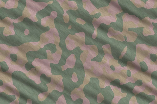 Camouflage fabric texture. Military uniform pattern background