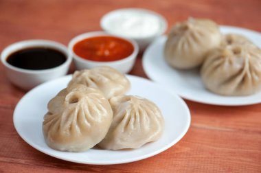 Buuza (poza) bir Buryat (Moğol) ulusal, Yapıştır paket yemektir.