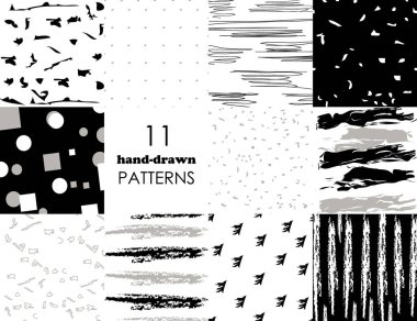 11 kümesi mürekkeple çizilmiş trendy desen fırça darbeleriyle el... Beyaz ve siyah arka plan üzerinde izole. Vektör desen tasarım için