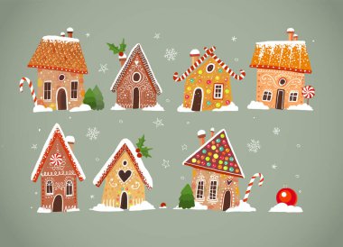 Noel süslemeleri olan bir sürü tatlı zencefilli kurabiye evi.