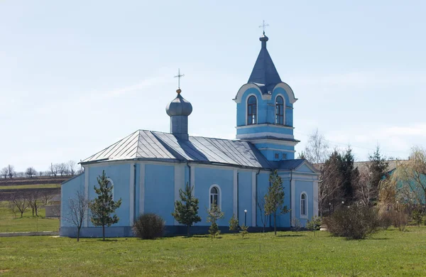 Ancient church of blue color in village — Stock Photo, Image