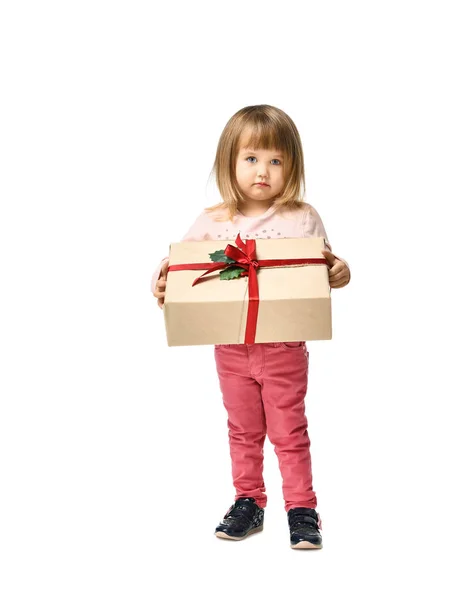 Little girl smile and holding red gift box on white background. — Stock Photo, Image