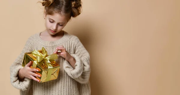 happy child girl with gift box