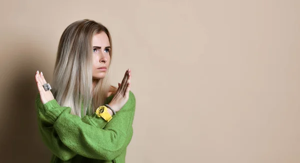 Portrait of serious, unhappy, confident blonde woman holding two arms crossed, gesturing no sign, looking away camera — Stock Photo, Image