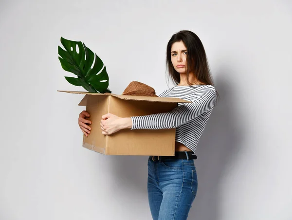 Young woman holding box with things. — Stock Photo, Image