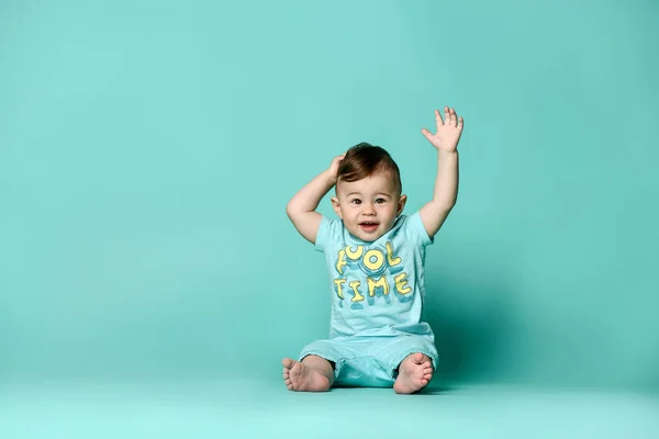 Little cute baby in blue t-shirt isolated — Stock Photo, Image