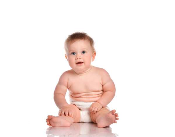 Smiling toddler isolated over white