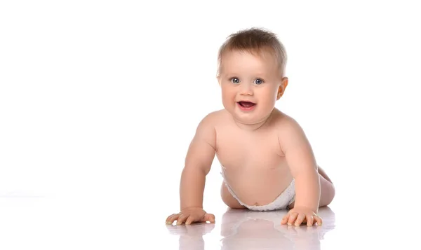 Little baby child smiling and crawling isolated on white in studio. — Stock Photo, Image