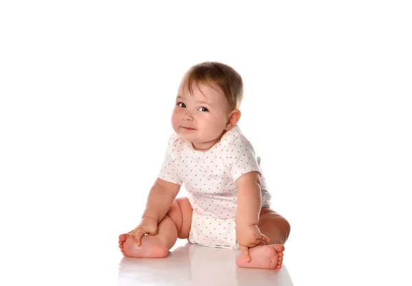 Little baby girl child on floor studio portrait — Stock Photo, Image