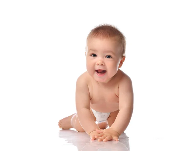 Cute little baby with evil smile crawling on floor — Stock Photo, Image