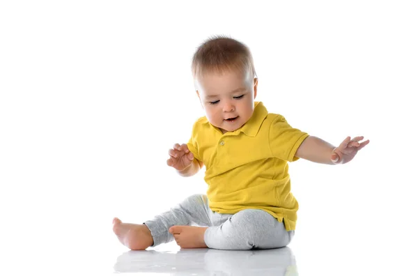 Casual little baby boy playing on floor portrait — Stock Photo, Image