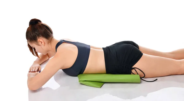 Woman relaxing on floor after exhausting workout — Stock Photo, Image