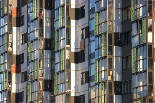 the geometry of textures on building, the construction of an apartment building of modern planning. concrete floor