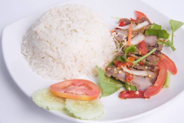 Izgara domuz salatası ve yasemin pirinç.