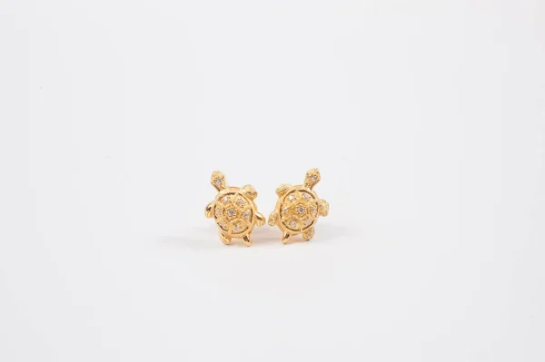 Gold Earrings Small Turtle Shaped Stock Image