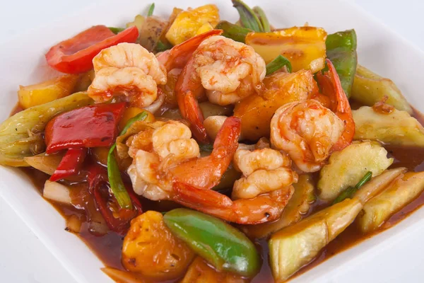 Sebze ve karidesle karıştırılmış tatlı ve ekşi sos..