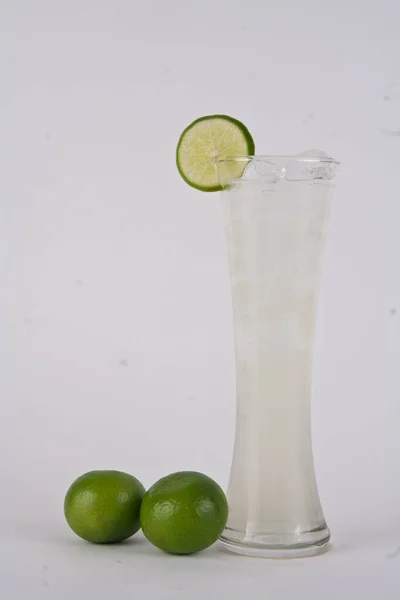 Full Glass Fresh Cool Tonic Lime Fruits Isolated White Background — Stock Photo, Image