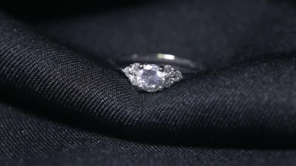 Jewellery diamond ring on the black background. — Stock Video