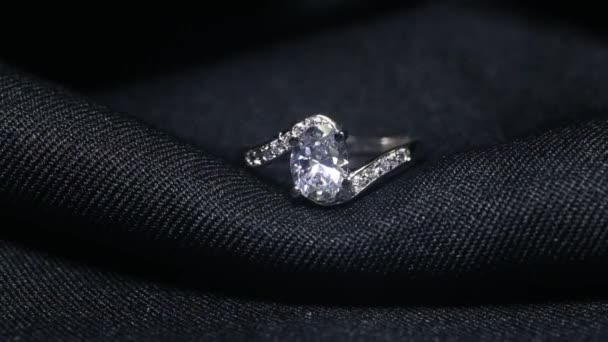 Jewellery diamond ring on the black background. — Stock Video