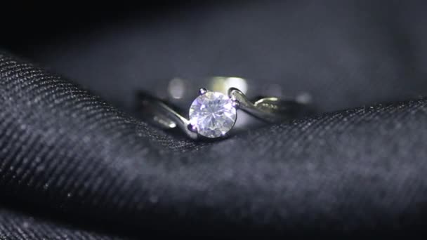 Jewellery diamond ring on the black background. — Stock Video