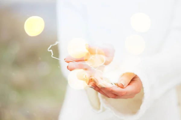 Girl Hand Verlichting Stockfoto