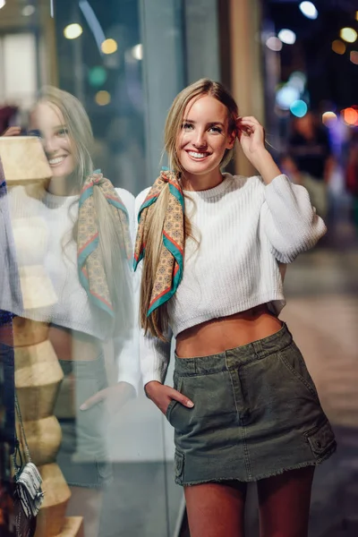 Blonde Girl Wearing White Sweater Smiling Street Defocused City Lights — Stock Photo, Image