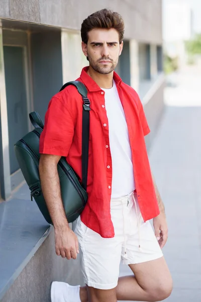 Fashionable man standing outdoors wearing casual clothes — Stock Photo, Image