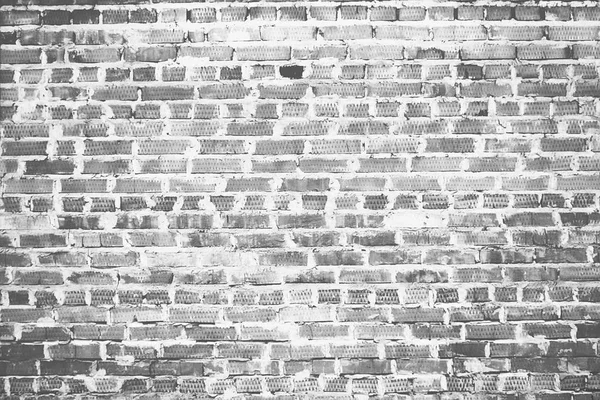 Grunge black and white brick wall background — Stock Photo, Image