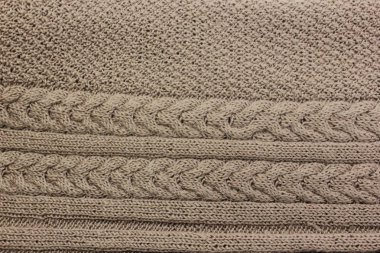 Bıçak bir yün iplik örme. açık renk. Hobiler ve yaratıcılık.