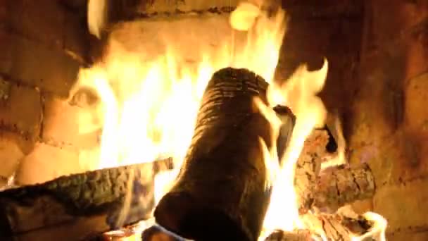 Hot Fire Blazes Stone Fireplace Reflected Brick Walls Christmas — Stock Video