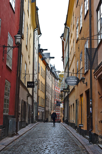 Stockholm/Sweden - October 27 2018 : Gamla stan or old street of Stockholm duing weekend. People come here for shopping and enjoin cafe in the town.