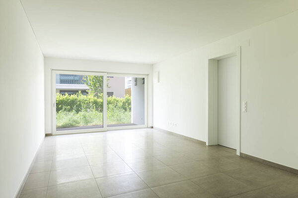 Interiors of modern apartment with white walls, nobody in the scene