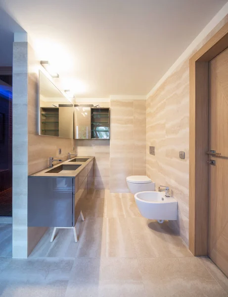 Modern apartment bathroom with fine finishes. Nobody inside.
