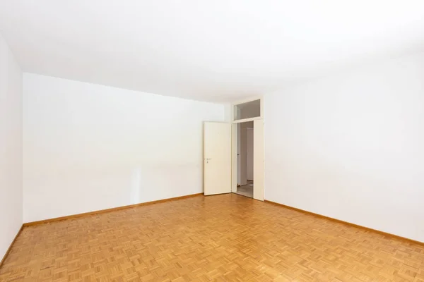 White empty room with open door, nobody inside