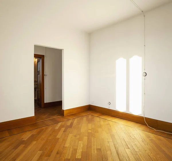 Empty room with sun entering and open doors. Nobody inside