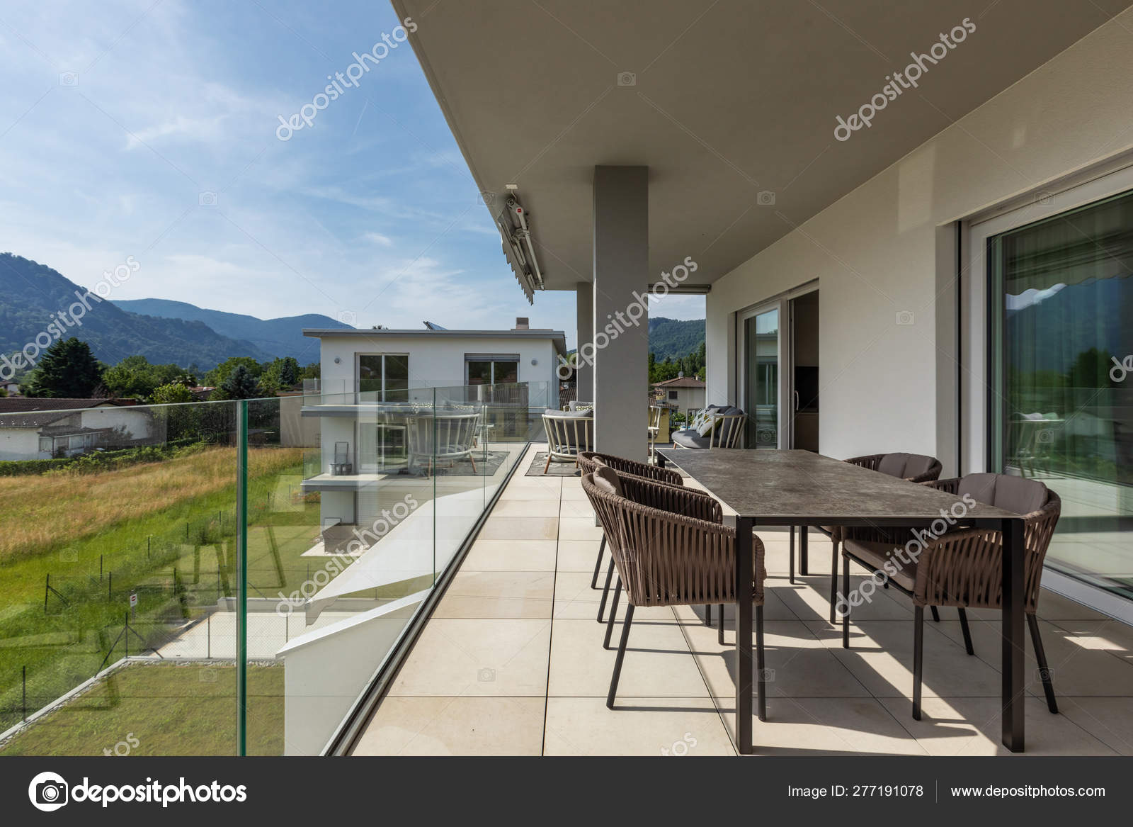 depositphotos_277191078-stock-photo-balcony-with-outdoor-furniture-in.jpg