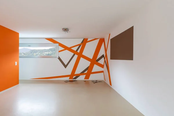 Front view of the room with white and orange walls — Stock Photo, Image