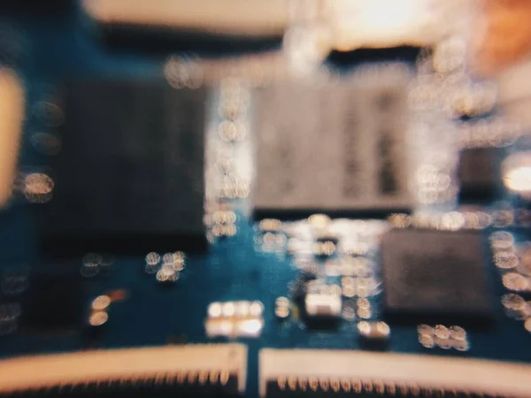 Electronic printed circuit board from welding machine,blur focus. — Stock Photo, Image