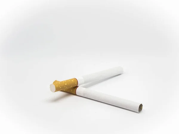 Dos Cigarrillos Marrones Sobre Fondo Blanco Aislado — Foto de Stock