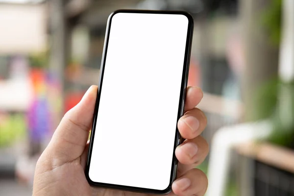 Hombre Mano Sosteniendo Teléfono Con Pantalla Aislada Fondo Una Calle —  Fotos de Stock