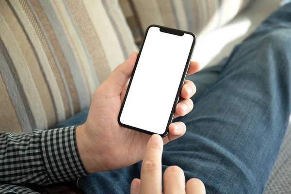 Male Hands Holding Phone Isolated Screen Room Sofa — Stock Photo, Image